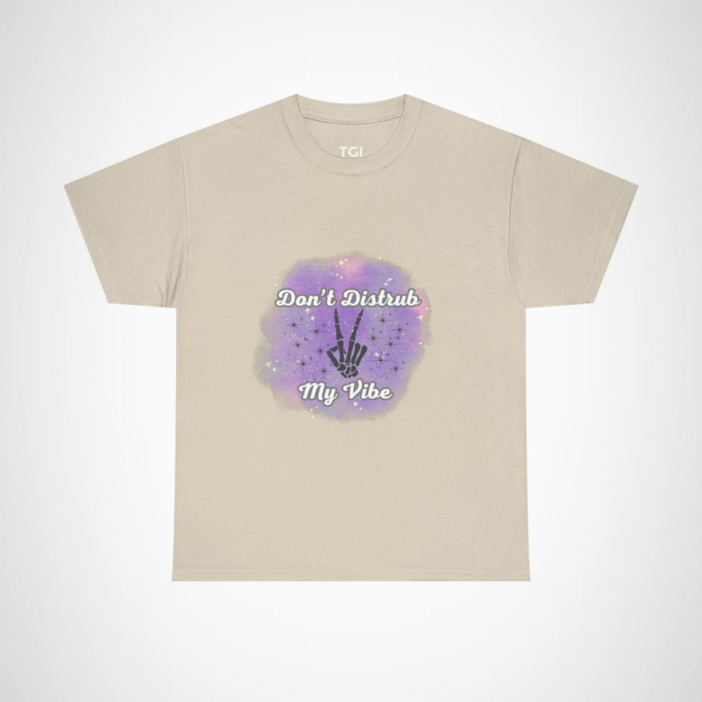 Don't Disturb My Vibe Skeleton Hand T-Shirt with a whimsical design against a watercolor backdrop Sand colour