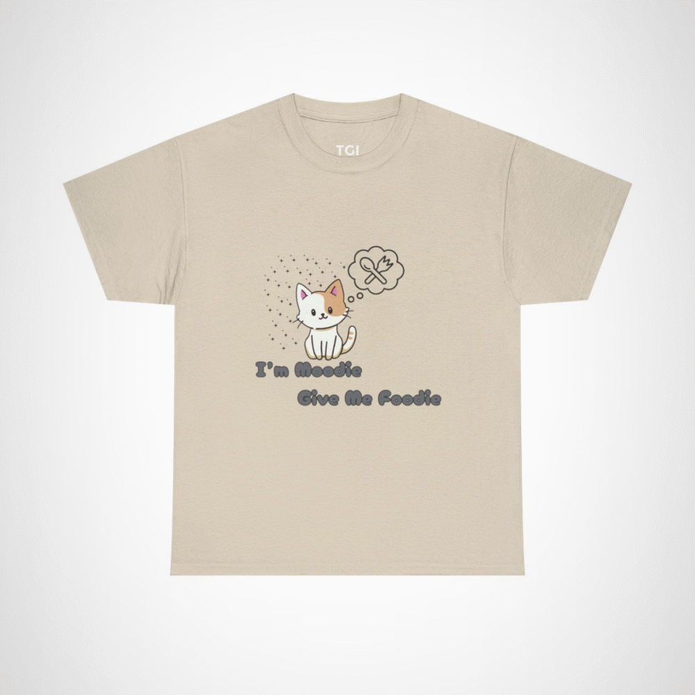 Cute 'I'm Moodie, Give Me Foodie' cat t-shirt for pet lovers, showcasing a playful design and soft fabric Sand colour